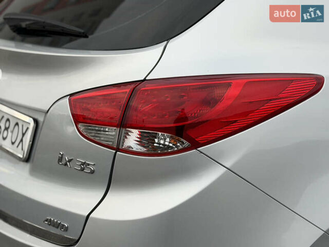 Сірий Хендай іх35, об'ємом двигуна 2 л та пробігом 132 тис. км за 11999 $, фото 9 на Automoto.ua