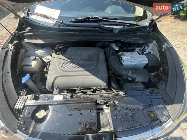 Сірий Хендай іх35, об'ємом двигуна 2 л та пробігом 307 тис. км за 11000 $, фото 23 на Automoto.ua