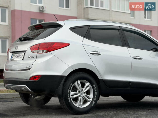 Сірий Хендай іх35, об'ємом двигуна 2 л та пробігом 132 тис. км за 11999 $, фото 8 на Automoto.ua