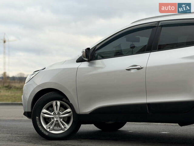 Сірий Хендай іх35, об'ємом двигуна 2 л та пробігом 132 тис. км за 11999 $, фото 12 на Automoto.ua