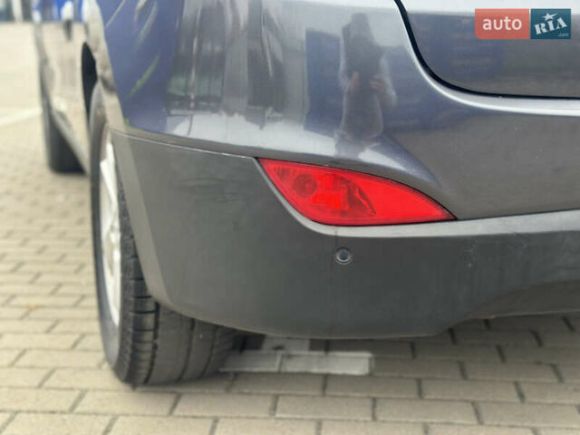 Серый Хендай их35, объемом двигателя 2 л и пробегом 170 тыс. км за 11700 $, фото 13 на Automoto.ua