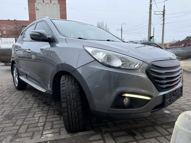 Сірий Хендай іх35, об'ємом двигуна 2 л та пробігом 186 тис. км за 11900 $, фото 4 на Automoto.ua