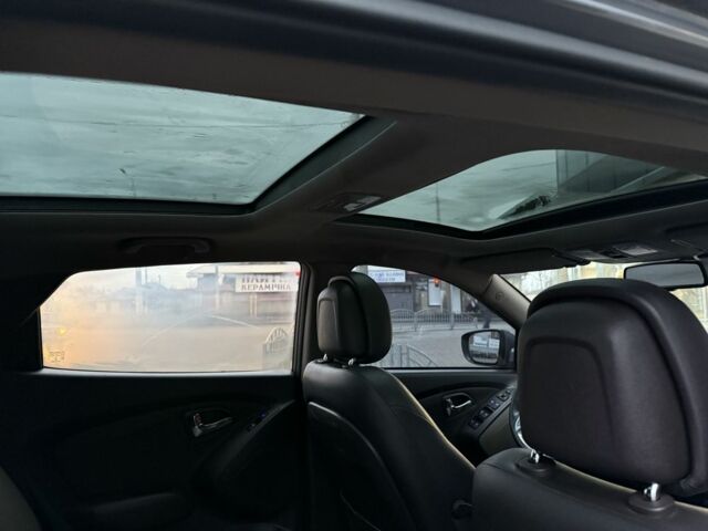 Сірий Хендай іх35, об'ємом двигуна 2 л та пробігом 186 тис. км за 11900 $, фото 7 на Automoto.ua