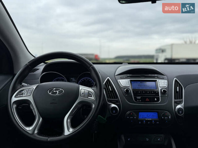 Сірий Хендай іх35, об'ємом двигуна 1.7 л та пробігом 235 тис. км за 11499 $, фото 31 на Automoto.ua