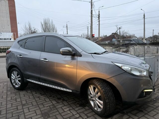 Сірий Хендай іх35, об'ємом двигуна 2 л та пробігом 186 тис. км за 11900 $, фото 23 на Automoto.ua