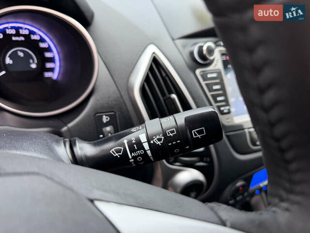 Сірий Хендай іх35, об'ємом двигуна 2 л та пробігом 132 тис. км за 11999 $, фото 32 на Automoto.ua