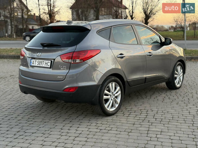 Сірий Хендай іх35, об'ємом двигуна 2 л та пробігом 262 тис. км за 13400 $, фото 5 на Automoto.ua