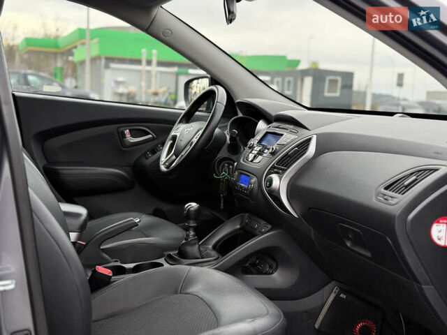 Сірий Хендай іх35, об'ємом двигуна 1.7 л та пробігом 235 тис. км за 11499 $, фото 26 на Automoto.ua