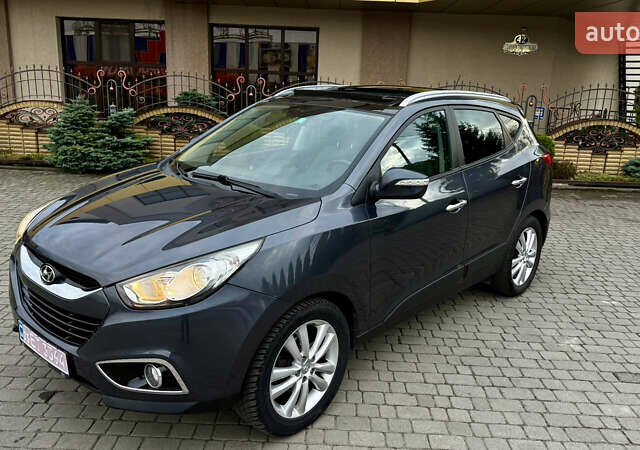 Серый Хендай их35, объемом двигателя 2 л и пробегом 245 тыс. км за 13500 $, фото 4 на Automoto.ua