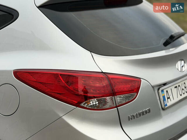 Сірий Хендай іх35, об'ємом двигуна 2 л та пробігом 132 тис. км за 11999 $, фото 13 на Automoto.ua