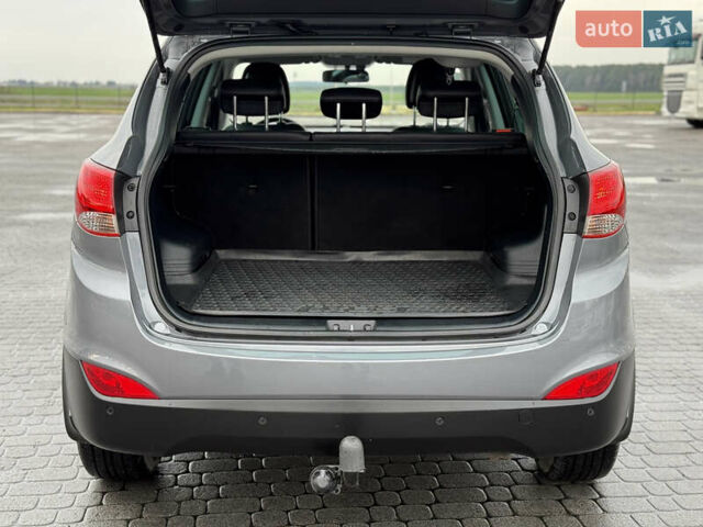 Сірий Хендай іх35, об'ємом двигуна 1.7 л та пробігом 235 тис. км за 11499 $, фото 23 на Automoto.ua