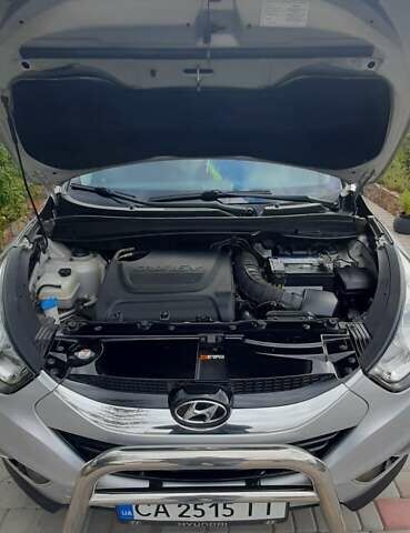 Сірий Хендай іх35, об'ємом двигуна 2 л та пробігом 178 тис. км за 13200 $, фото 6 на Automoto.ua