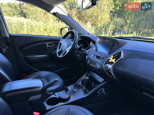 Сірий Хендай іх35, об'ємом двигуна 2 л та пробігом 194 тис. км за 11490 $, фото 10 на Automoto.ua