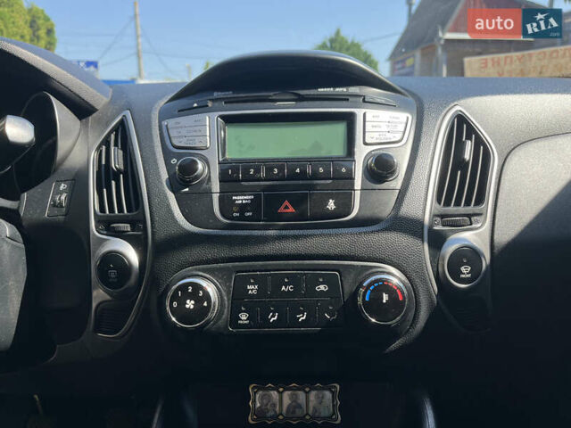 Сірий Хендай іх35, об'ємом двигуна 2 л та пробігом 307 тис. км за 11000 $, фото 13 на Automoto.ua