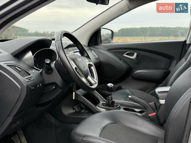Сірий Хендай іх35, об'ємом двигуна 1.7 л та пробігом 235 тис. км за 11499 $, фото 14 на Automoto.ua