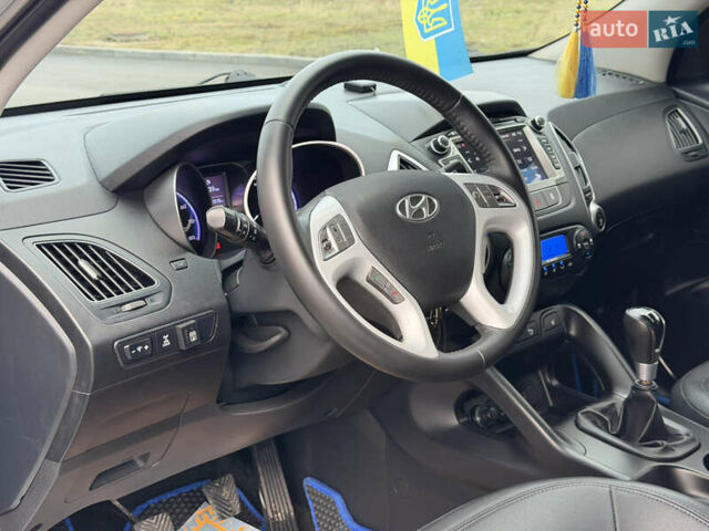 Сірий Хендай іх35, об'ємом двигуна 2 л та пробігом 132 тис. км за 11999 $, фото 24 на Automoto.ua