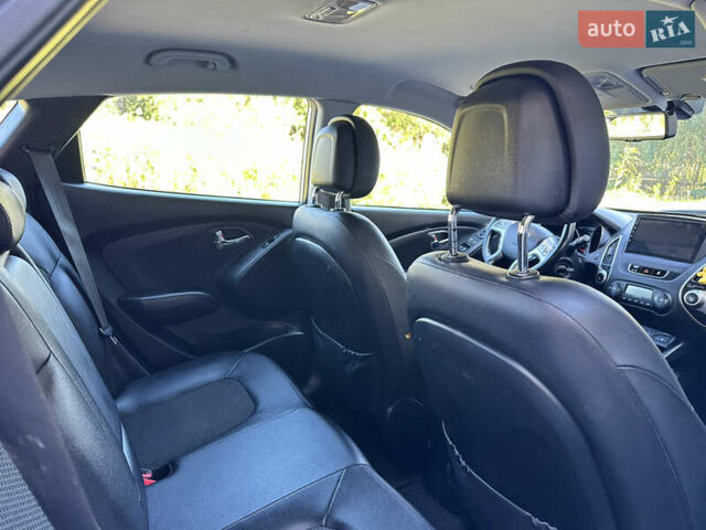 Сірий Хендай іх35, об'ємом двигуна 2 л та пробігом 194 тис. км за 11490 $, фото 8 на Automoto.ua