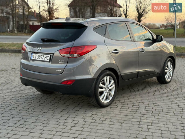 Сірий Хендай іх35, об'ємом двигуна 2 л та пробігом 262 тис. км за 13400 $, фото 4 на Automoto.ua