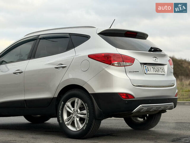 Сірий Хендай іх35, об'ємом двигуна 2 л та пробігом 132 тис. км за 11999 $, фото 14 на Automoto.ua