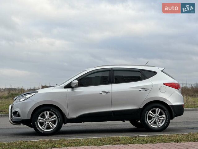 Сірий Хендай іх35, об'ємом двигуна 2 л та пробігом 132 тис. км за 11999 $, фото 17 на Automoto.ua