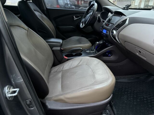 Сірий Хендай іх35, об'ємом двигуна 2 л та пробігом 186 тис. км за 11900 $, фото 12 на Automoto.ua