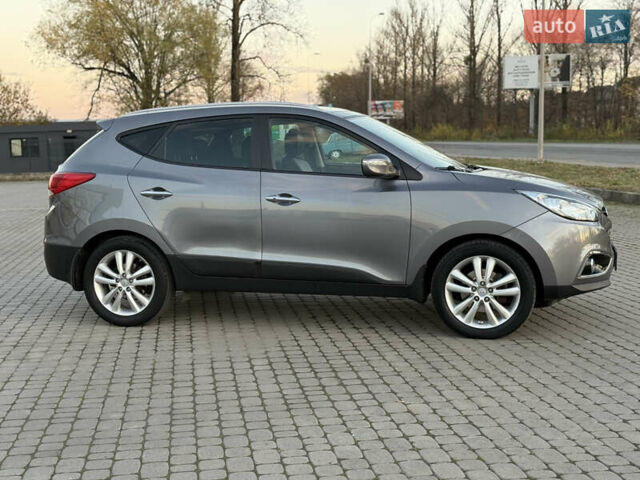 Сірий Хендай іх35, об'ємом двигуна 2 л та пробігом 262 тис. км за 13400 $, фото 3 на Automoto.ua