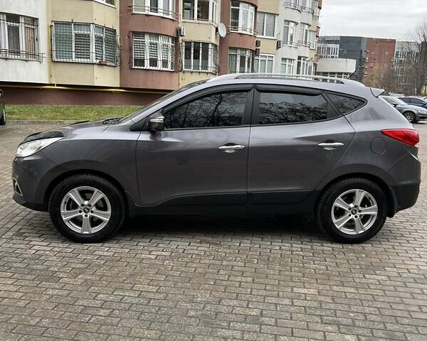 Сірий Хендай іх35, об'ємом двигуна 2.36 л та пробігом 220 тис. км за 11750 $, фото 4 на Automoto.ua