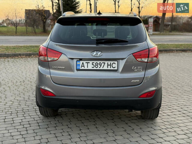 Сірий Хендай іх35, об'ємом двигуна 2 л та пробігом 262 тис. км за 13400 $, фото 6 на Automoto.ua