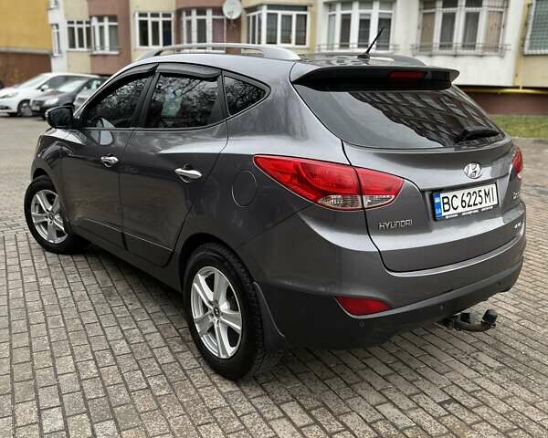 Сірий Хендай іх35, об'ємом двигуна 2.36 л та пробігом 220 тис. км за 11750 $, фото 1 на Automoto.ua
