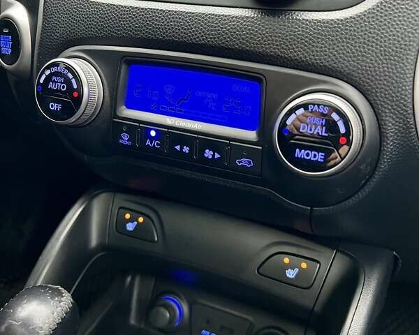 Сірий Хендай іх35, об'ємом двигуна 2.36 л та пробігом 220 тис. км за 11750 $, фото 23 на Automoto.ua