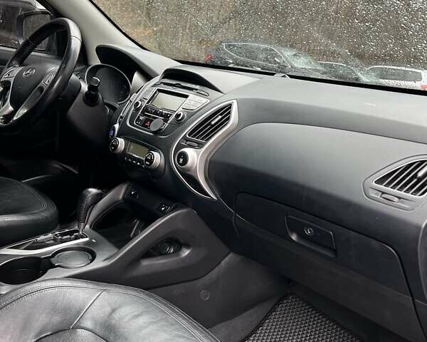 Сірий Хендай іх35, об'ємом двигуна 2.36 л та пробігом 220 тис. км за 11750 $, фото 11 на Automoto.ua