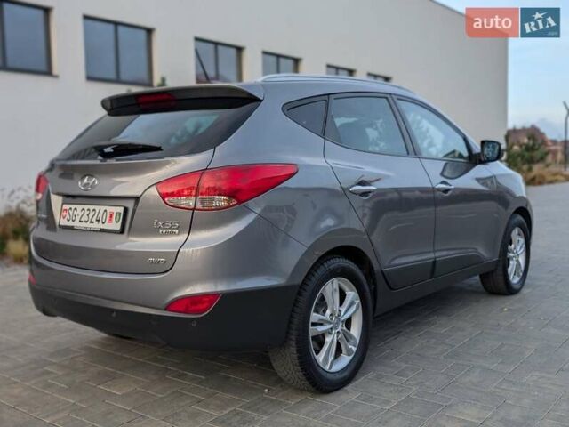 Сірий Хендай іх35, об'ємом двигуна 2 л та пробігом 222 тис. км за 13950 $, фото 8 на Automoto.ua