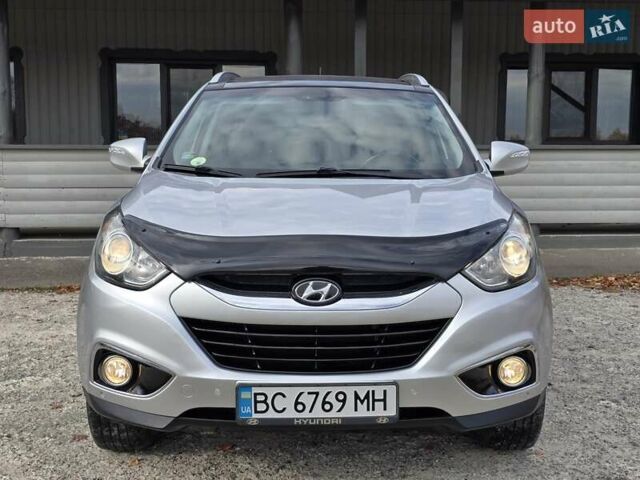 Сірий Хендай іх35, об'ємом двигуна 1.69 л та пробігом 308 тис. км за 11999 $, фото 2 на Automoto.ua