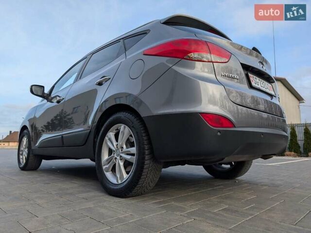 Сірий Хендай іх35, об'ємом двигуна 2 л та пробігом 222 тис. км за 13950 $, фото 22 на Automoto.ua