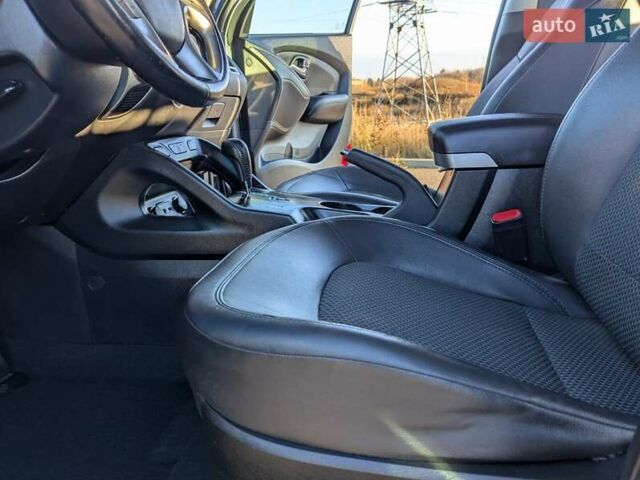 Сірий Хендай іх35, об'ємом двигуна 2 л та пробігом 175 тис. км за 10900 $, фото 34 на Automoto.ua