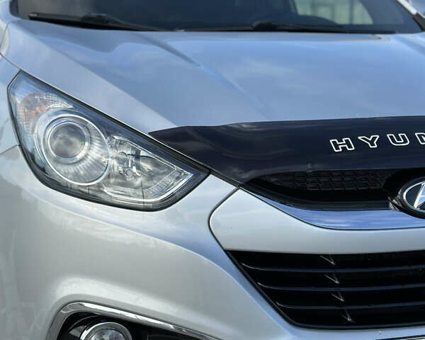 Сірий Хендай іх35, об'ємом двигуна 2 л та пробігом 190 тис. км за 12500 $, фото 1 на Automoto.ua