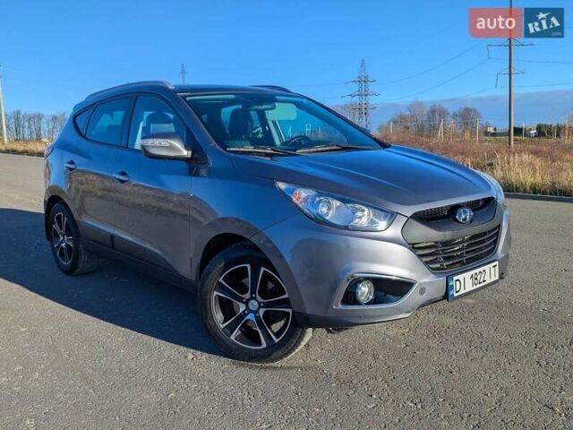 Сірий Хендай іх35, об'ємом двигуна 2 л та пробігом 175 тис. км за 10900 $, фото 9 на Automoto.ua