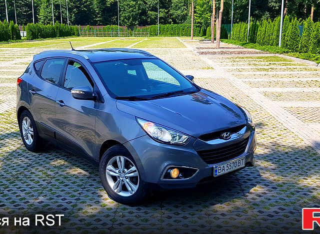 Сірий Хендай іх35, об'ємом двигуна 2 л та пробігом 235 тис. км за 11100 $, фото 7 на Automoto.ua