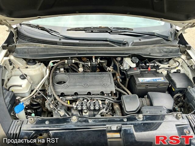 Серый Хендай их35, объемом двигателя 2.4 л и пробегом 155 тыс. км за 11999 $, фото 13 на Automoto.ua