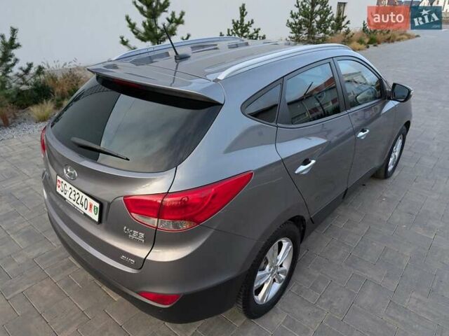 Сірий Хендай іх35, об'ємом двигуна 2 л та пробігом 222 тис. км за 13950 $, фото 17 на Automoto.ua
