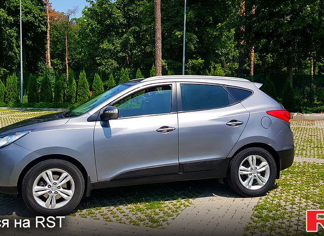 Сірий Хендай іх35, об'ємом двигуна 2 л та пробігом 235 тис. км за 11100 $, фото 5 на Automoto.ua