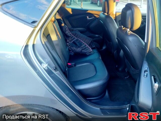 Сірий Хендай іх35, об'ємом двигуна 2 л та пробігом 230 тис. км за 11750 $, фото 9 на Automoto.ua