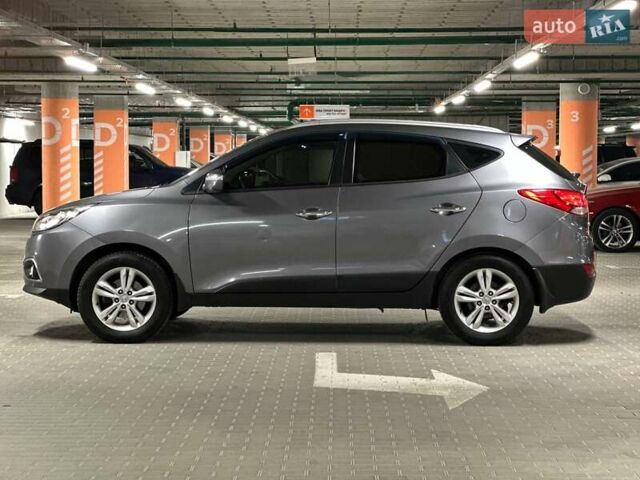 Сірий Хендай іх35, об'ємом двигуна 2 л та пробігом 176 тис. км за 11500 $, фото 6 на Automoto.ua