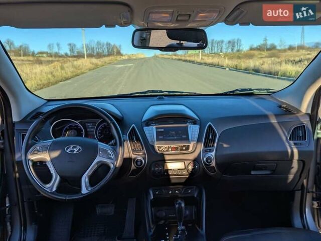 Сірий Хендай іх35, об'ємом двигуна 2 л та пробігом 175 тис. км за 10900 $, фото 41 на Automoto.ua