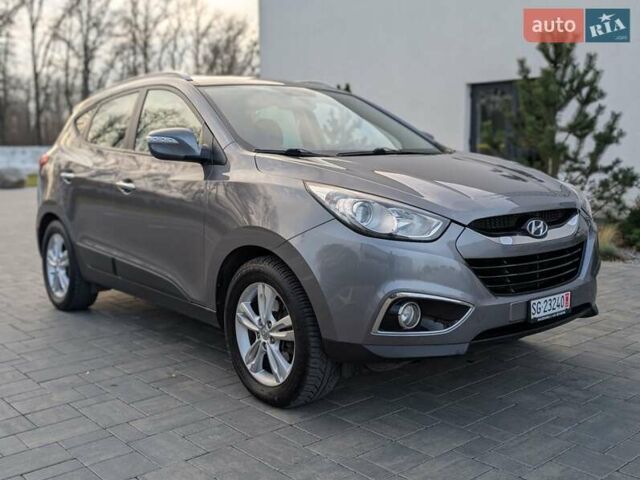 Сірий Хендай іх35, об'ємом двигуна 2 л та пробігом 222 тис. км за 13950 $, фото 4 на Automoto.ua