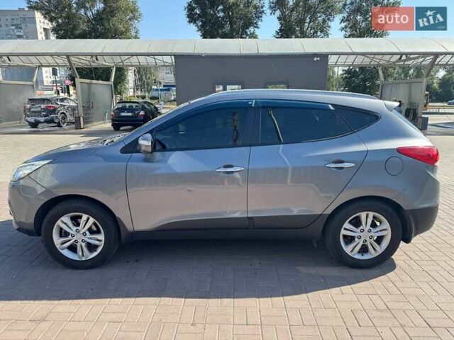 Сірий Хендай іх35, об'ємом двигуна 2 л та пробігом 175 тис. км за 12500 $, фото 1 на Automoto.ua