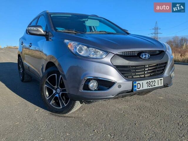 Сірий Хендай іх35, об'ємом двигуна 2 л та пробігом 175 тис. км за 10900 $, фото 4 на Automoto.ua