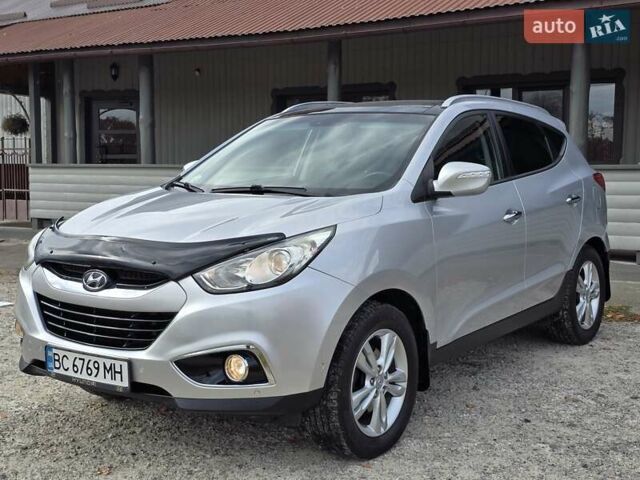 Сірий Хендай іх35, об'ємом двигуна 1.69 л та пробігом 308 тис. км за 11999 $, фото 3 на Automoto.ua