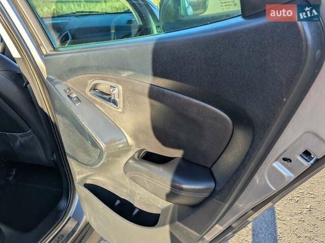 Сірий Хендай іх35, об'ємом двигуна 2 л та пробігом 175 тис. км за 10900 $, фото 48 на Automoto.ua