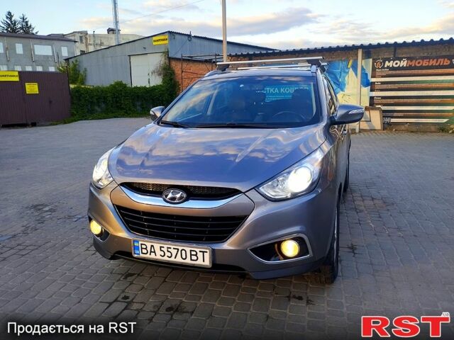 Сірий Хендай іх35, об'ємом двигуна 2 л та пробігом 230 тис. км за 11750 $, фото 3 на Automoto.ua